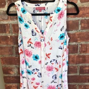White Tank w/multi-colored floral design. Size M